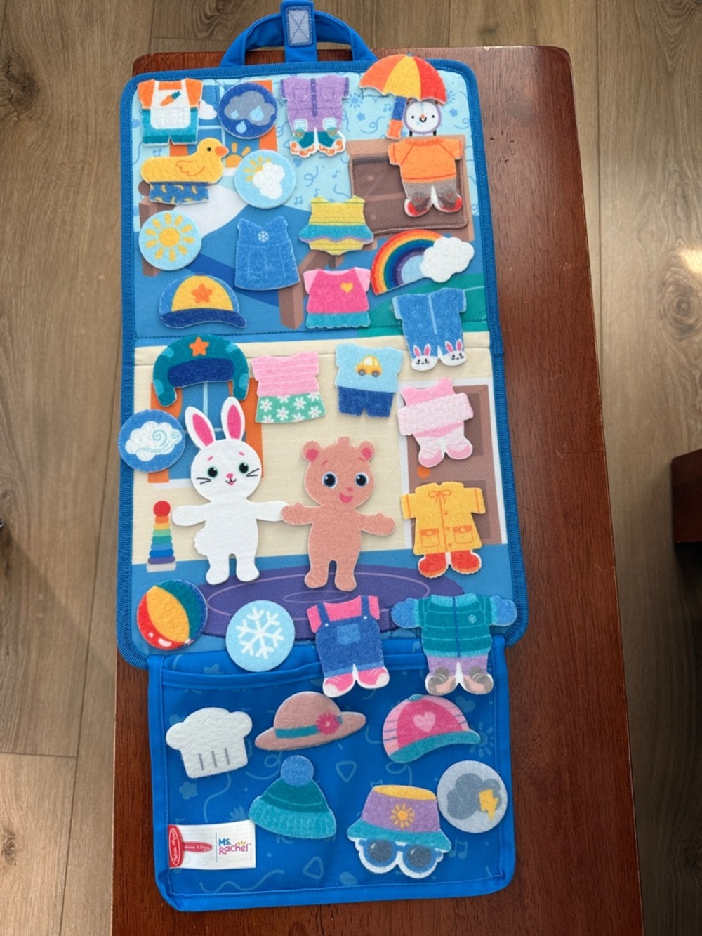 Melissa & Doug Ms. Rachel What to Wear Felt Activity Board Take-Along Toy
